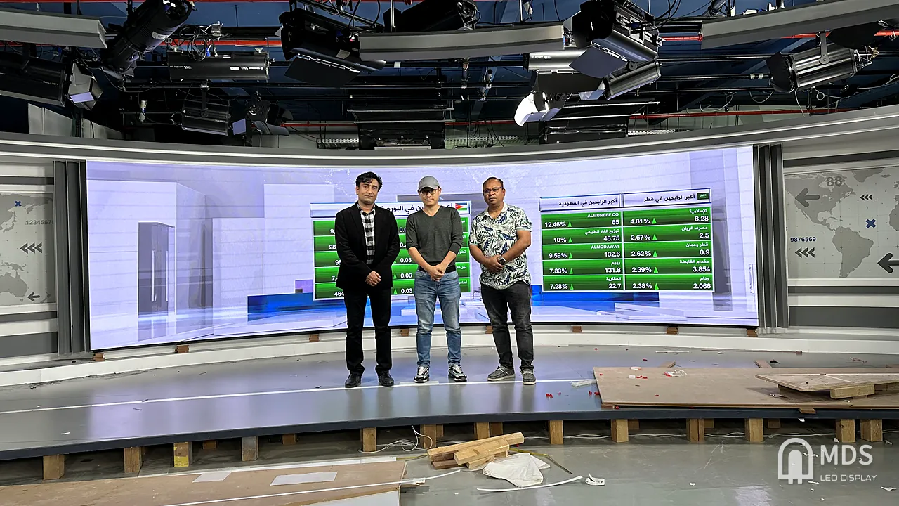 MDS engineers on the CNBC Arabia studio set after commissioning the curved LED video wall