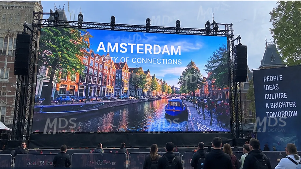MDS outdoor COB rental LED screen on a stage truss at an outdoor event in Amsterdam, July 2026